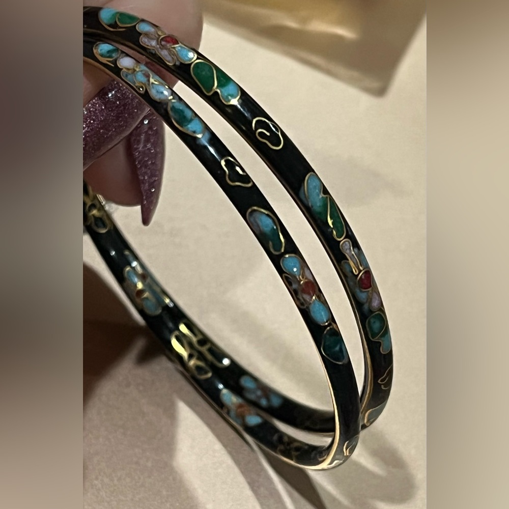 2 black cloisonne bangle bracelets with baby blue flowers. Size 7.8